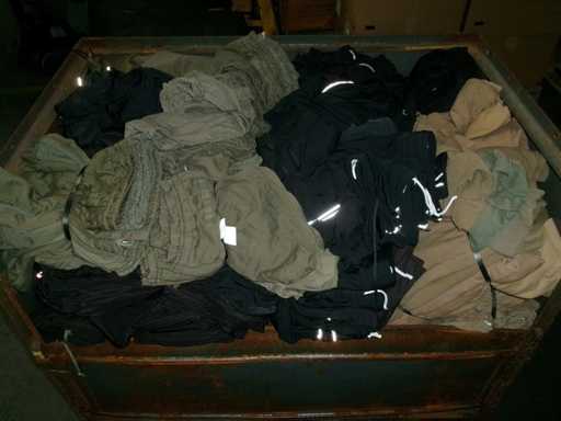 kg Mélange de vêtements, défectueux, taché (G3) (120kg)