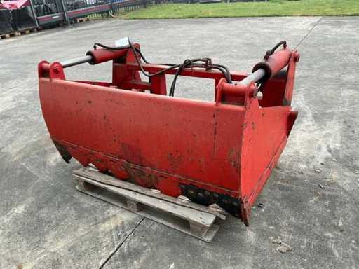 Saisie d’ensilage de roche rouge