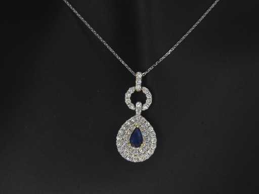 Gold pendant with sapphire and diamond teardrop shape
