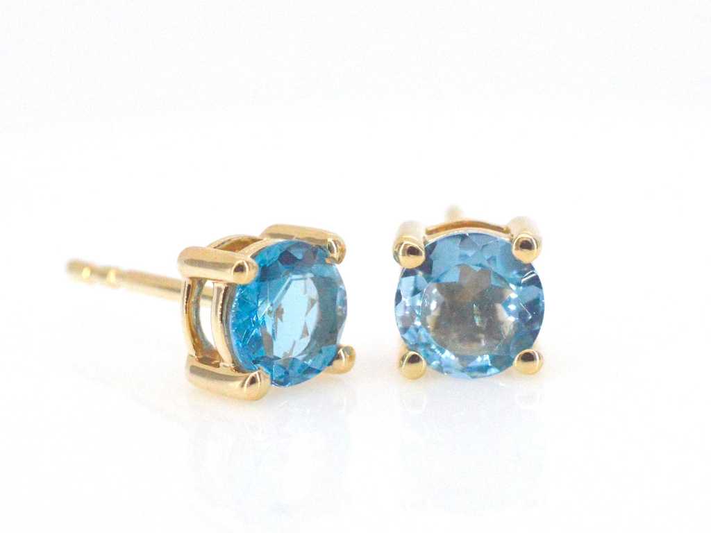 Gold earrings with topaz