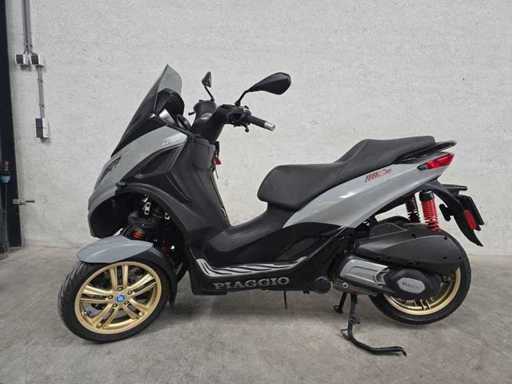 Collector's auction scooters and motorcycles