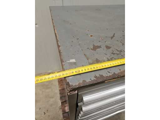   Tool cabinet with assorted milling cutters and tool holders