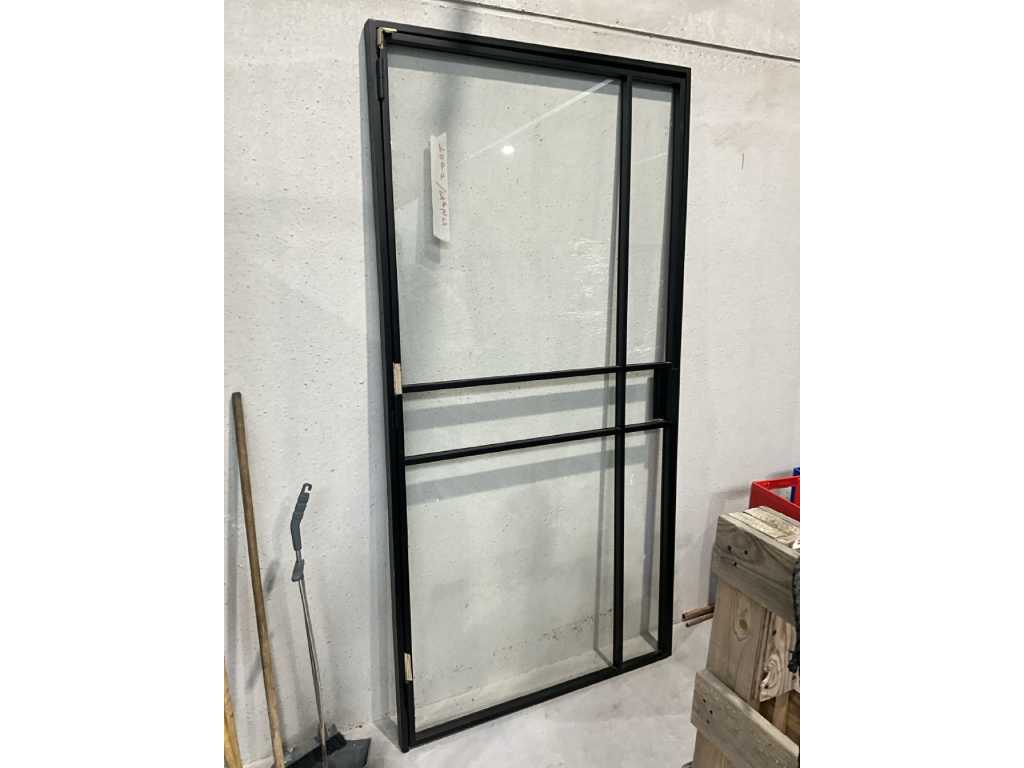 Steel door 1094 x 2152 mm.