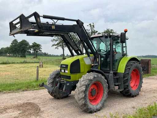 Trattore agricolo Claas Ares 656 RZ a trazione integrale del 2002 con caricatore frontale