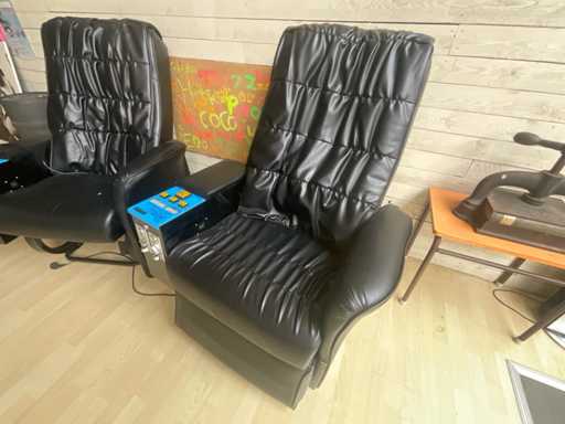 Massagefauteuil met muntmechanisme