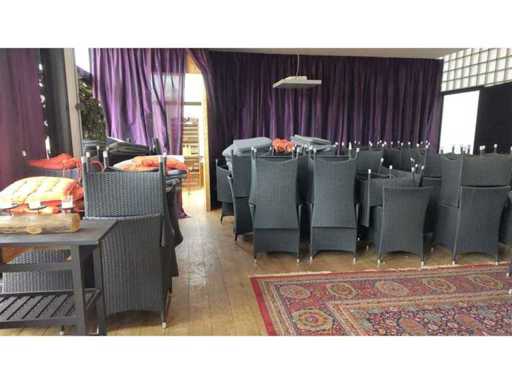 Patio furniture- black PE rattan - garden chairs - +\- 70 pieces - various cushions - 4x standing table  