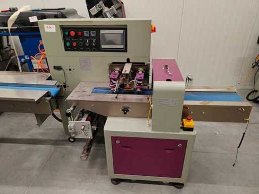 TC20 - Mașină automată de ambalare cu pachete de flux