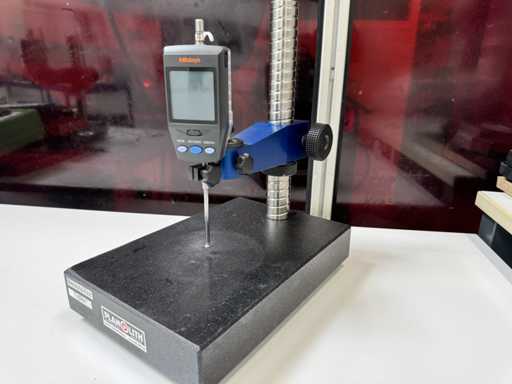   Support de mesure avec comparateur