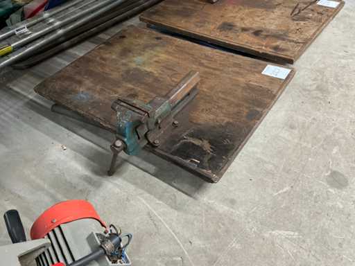 Folding work table with vice