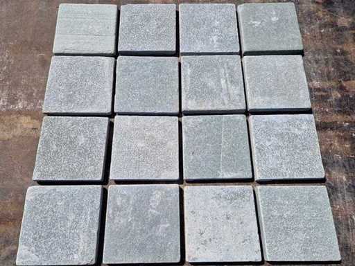 Natural stone tiles (approx. 15m²)