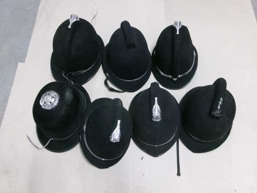 Brit. Polizei Bobby Helme, defekt (U2) (7x)