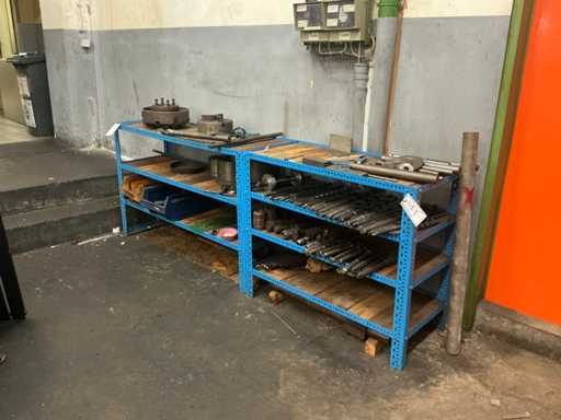 Shelf with lathe accessories and drills