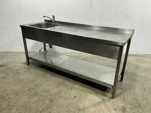 Stainless steel work table with sink
