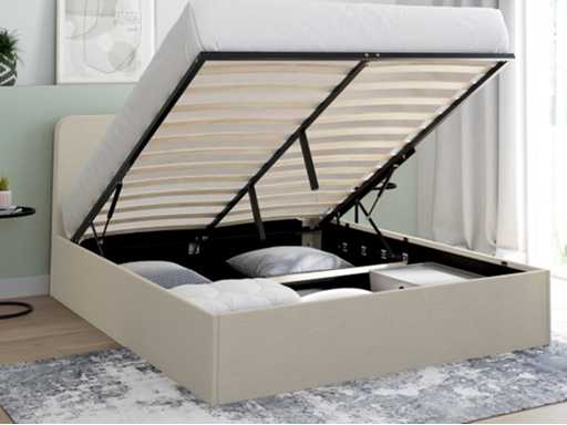 Beige stoffen borstbed met bedvoet en afgerond hoofdeinde 140x190cm