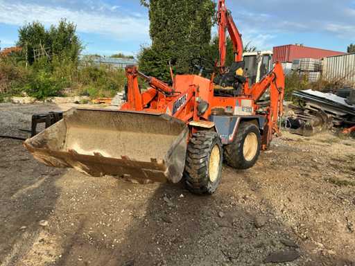 Kubota R310 met backhoe Shovel