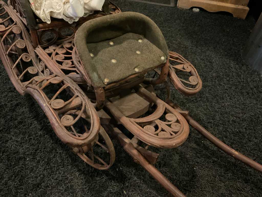 Antique doll store carriage