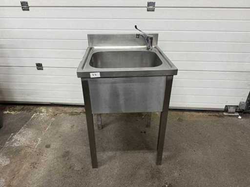 Stainless steel sink with tap