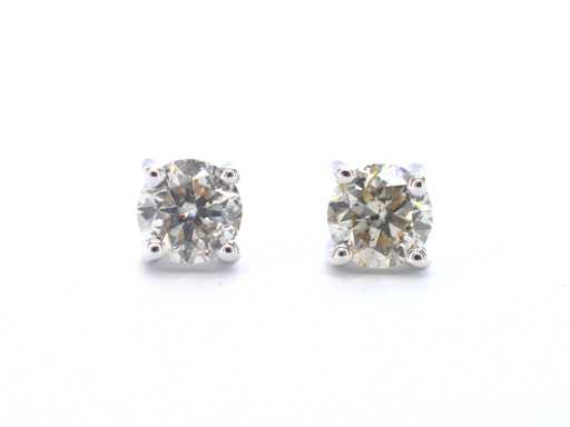 Cercei solitari din aur alb cu diamante tăiate cu brio