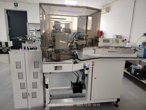 Komax - Gamma 311 - Seaming stripper cutting machine