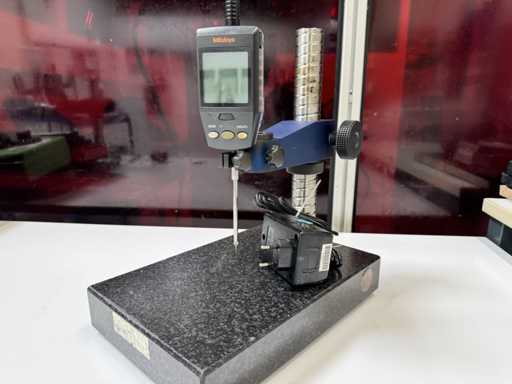   Support de mesure avec comparateur