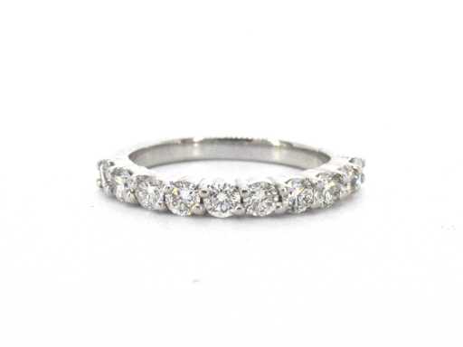 Gouden half-alliance ring van 18 karaat met 10 briljant geslepen natuurlijke diamanten
