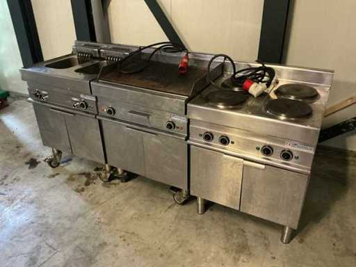 Professional Modular stainless steel catering setup consisting of double fryer, grill plate and 4-burner stove on three-phase power