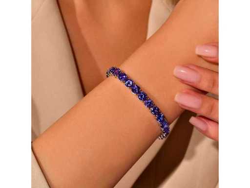 Luxe tennisarmband in Natural Tanzanite AA+ 30,80 karaat in 18 karaat witgoud 25,45 gr