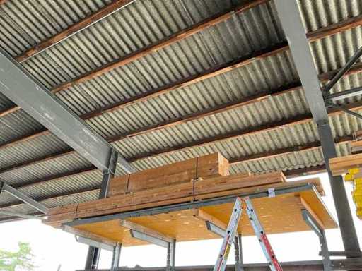 Lot of squared timber and formwork panels