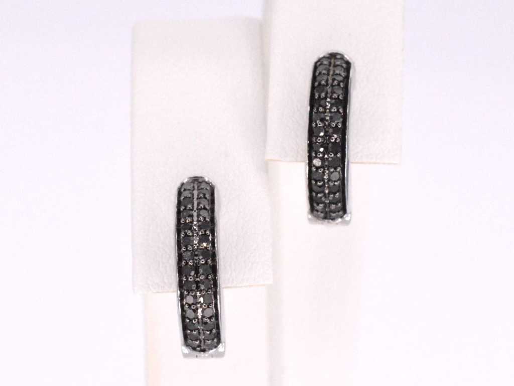 White gold earrings with black diamond