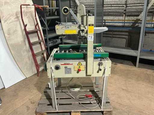 Comarme - 2000 - Case sealing machine