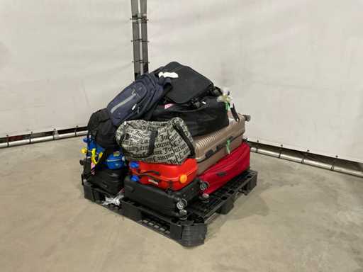 Suitcases and weekend bags with unknown contents