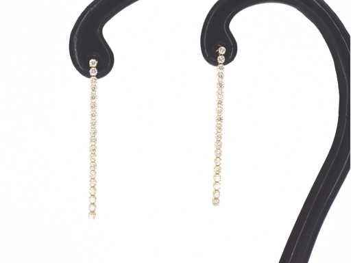 Gouden oorhangers met een rij aan natuurlijke diamanten