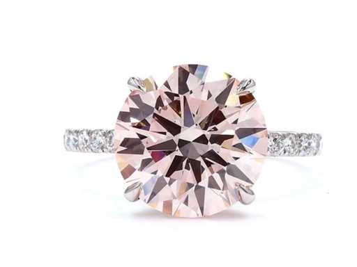 Platina ring met 5,02 crt. roze diamant.