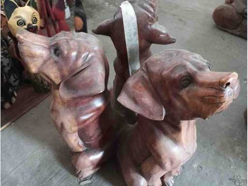 Table pedestal with three teak dogs and glass disc