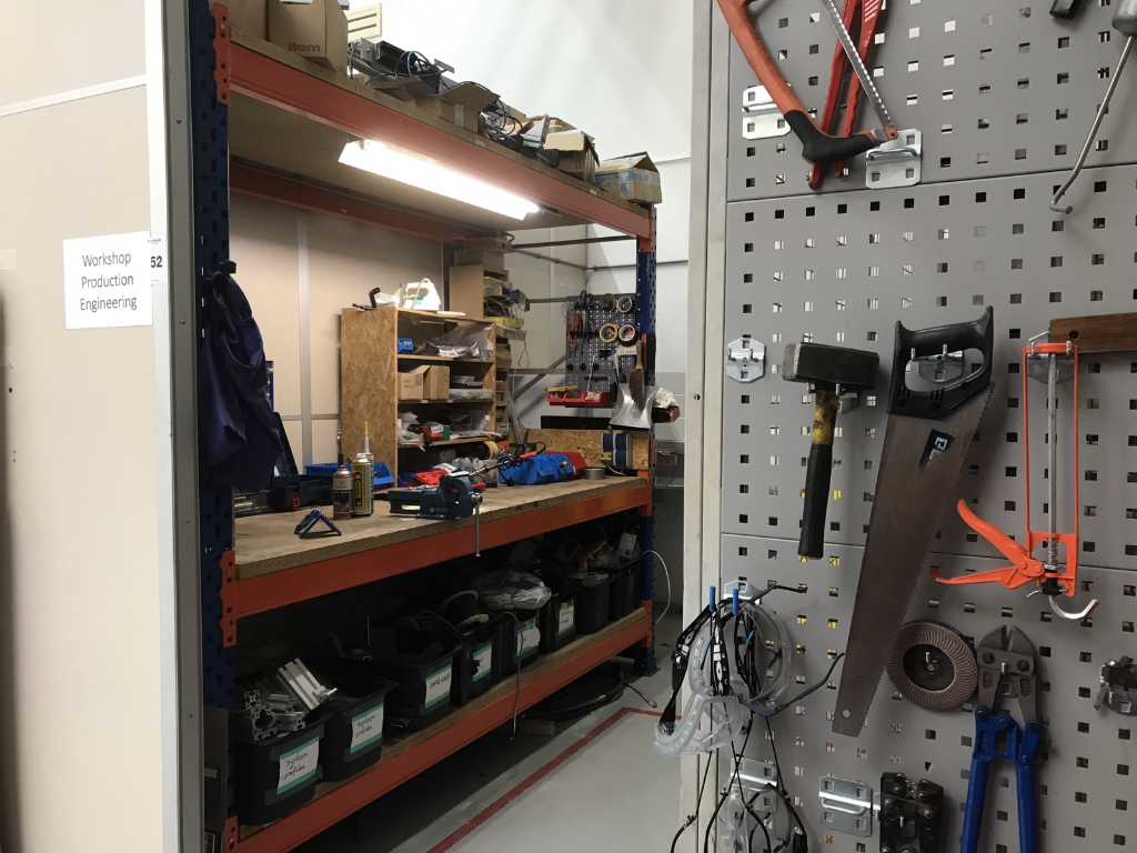 Workbench shelving unit with contents