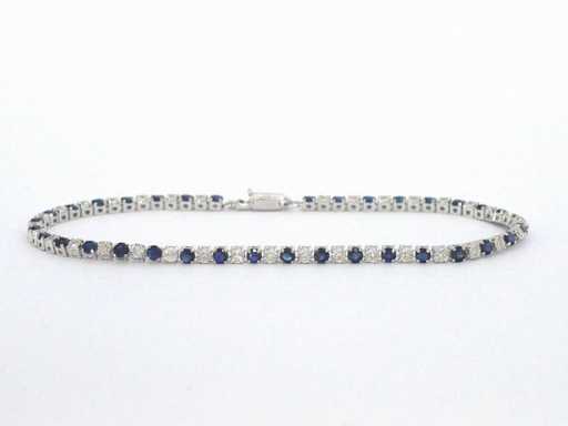 Bracelet de tennis en or blanc avec diamants et saphirs