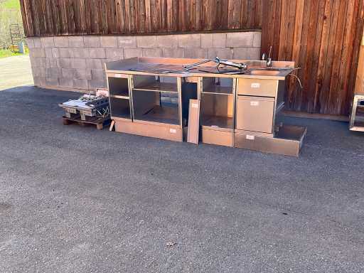 Stainless steel kitchen with induction stove and sink